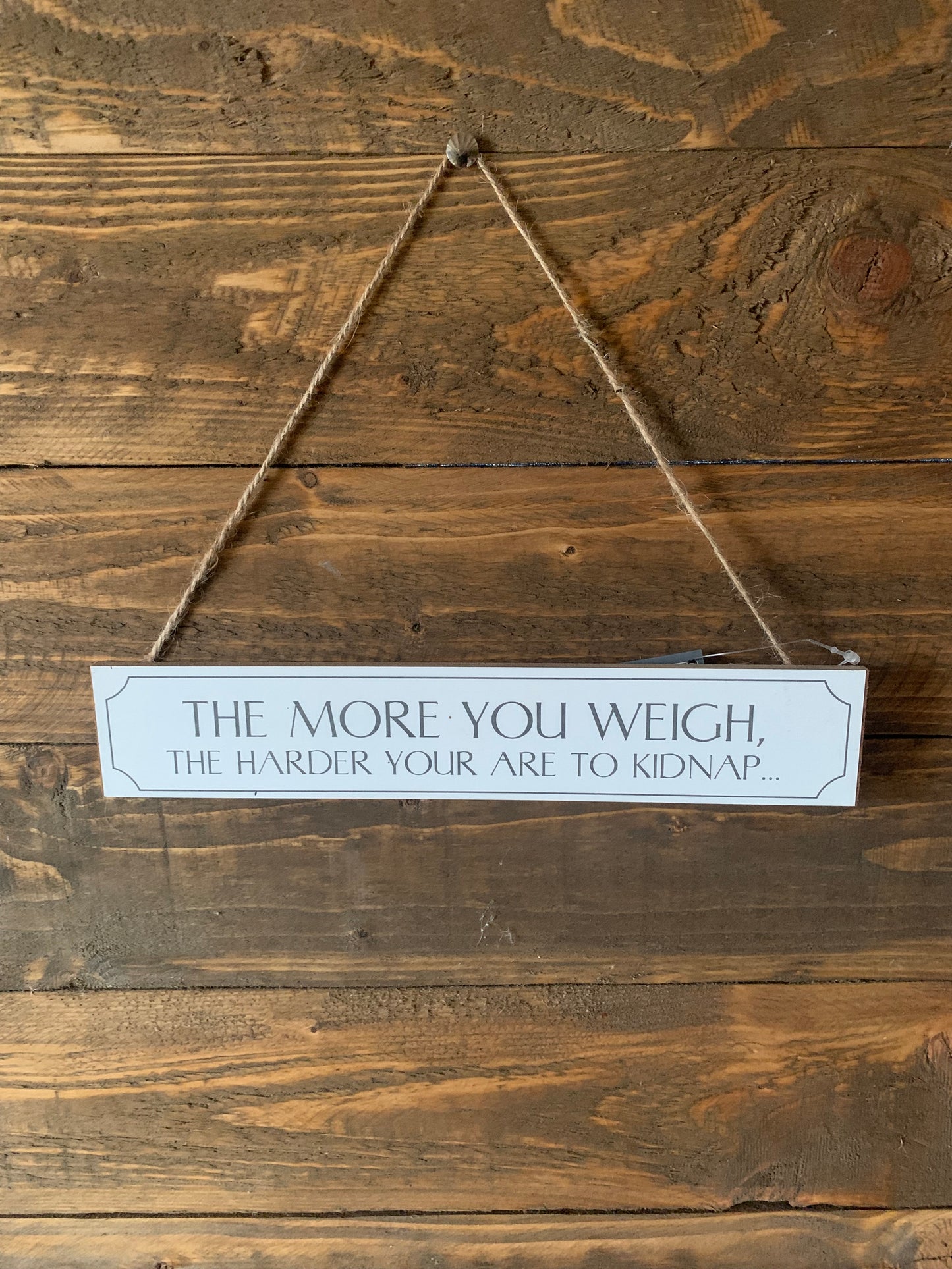 The more you weigh.... wooden sign